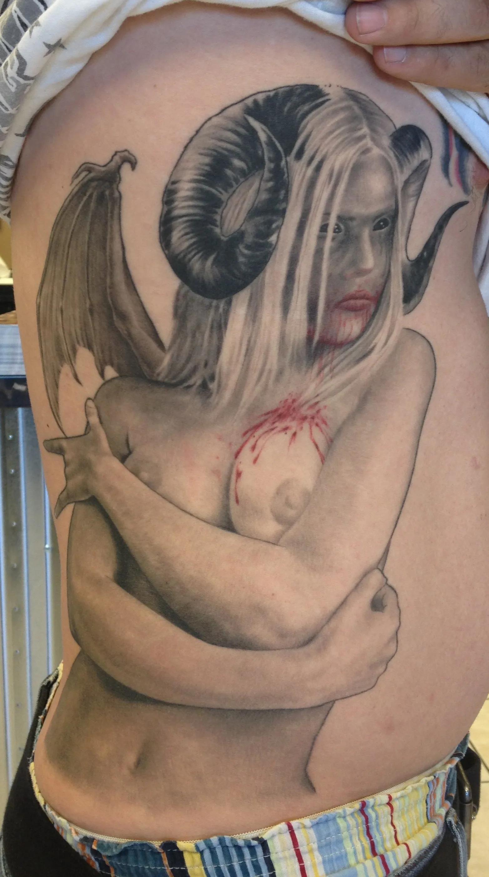 LARGE SCALE tattoo by Disciple Tattoo