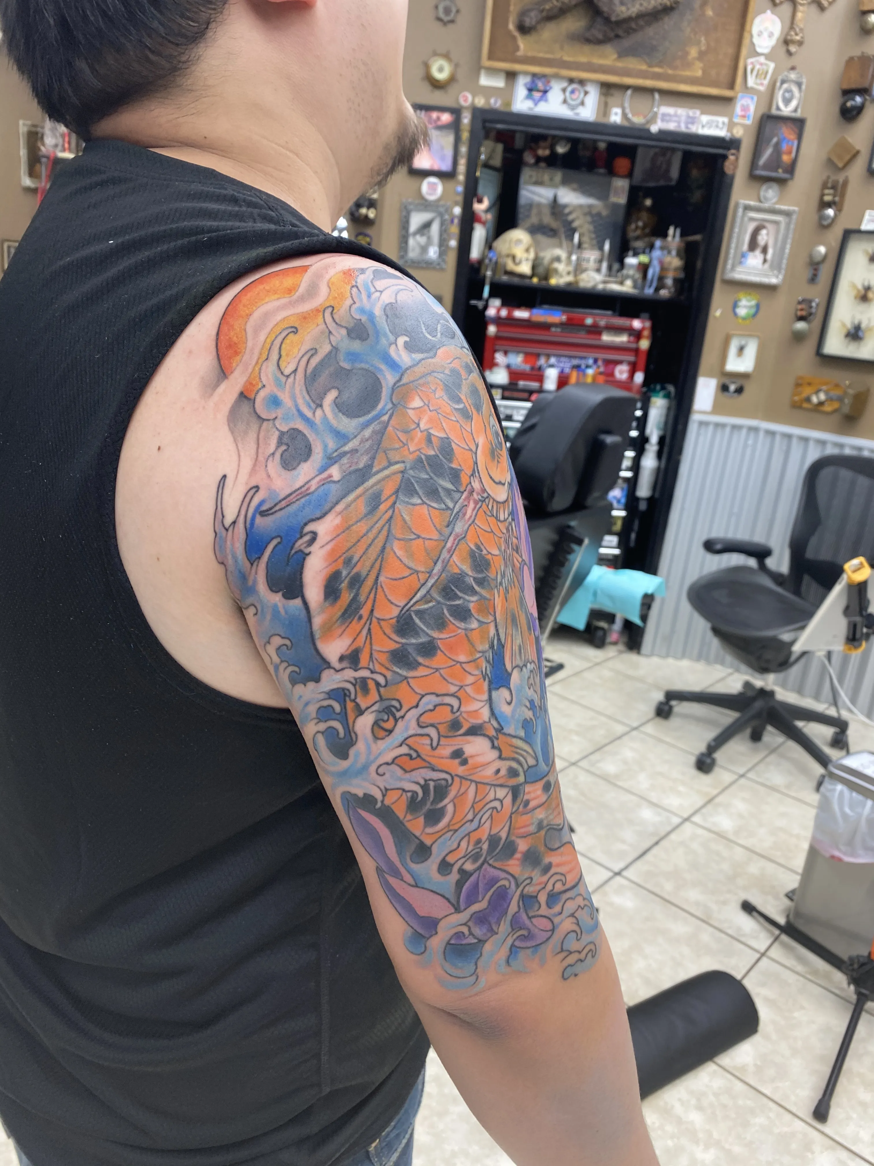 LARGE SCALE tattoo by Disciple Tattoo
