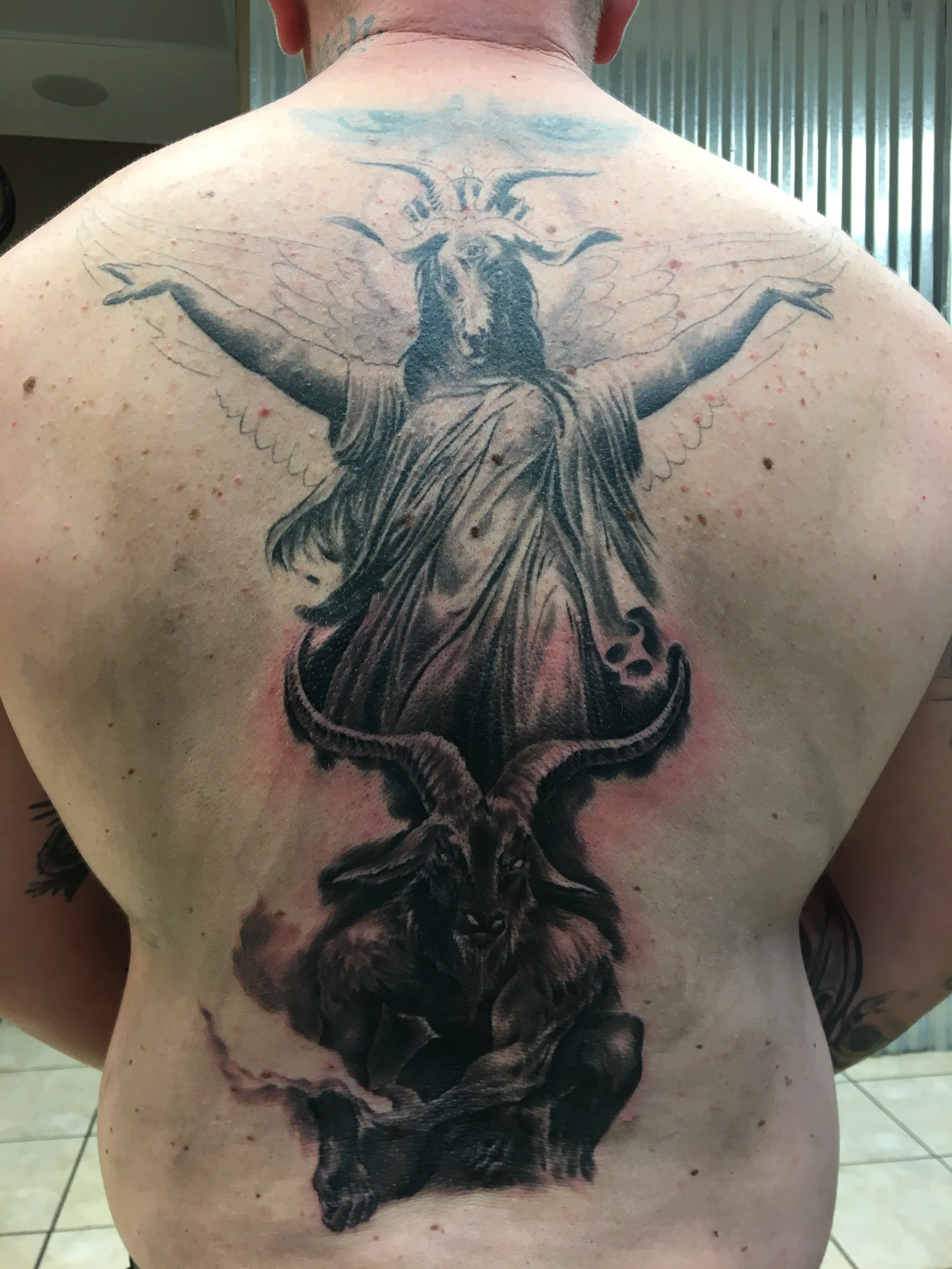 LARGE SCALE tattoo by Disciple Tattoo